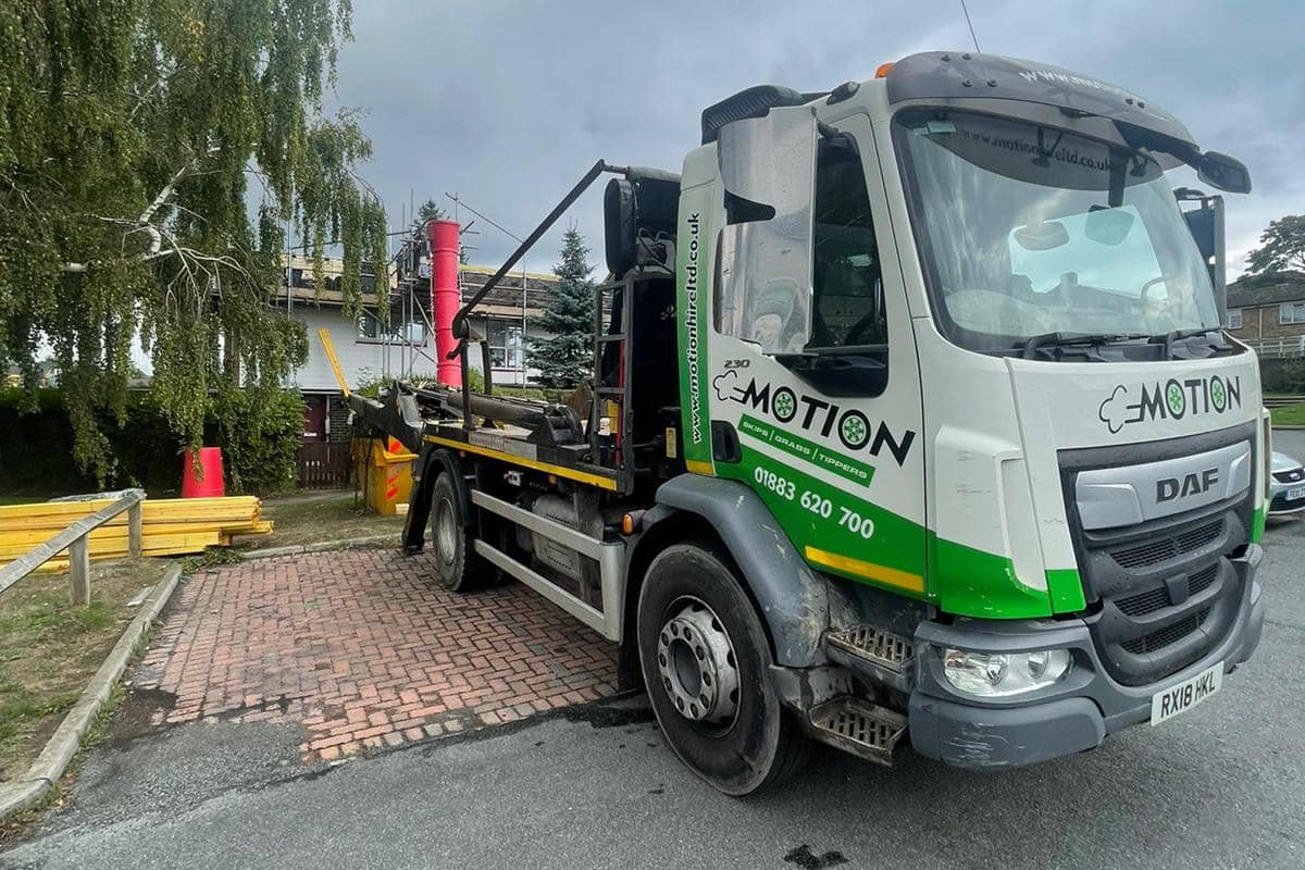 Motion Waste truck on a site